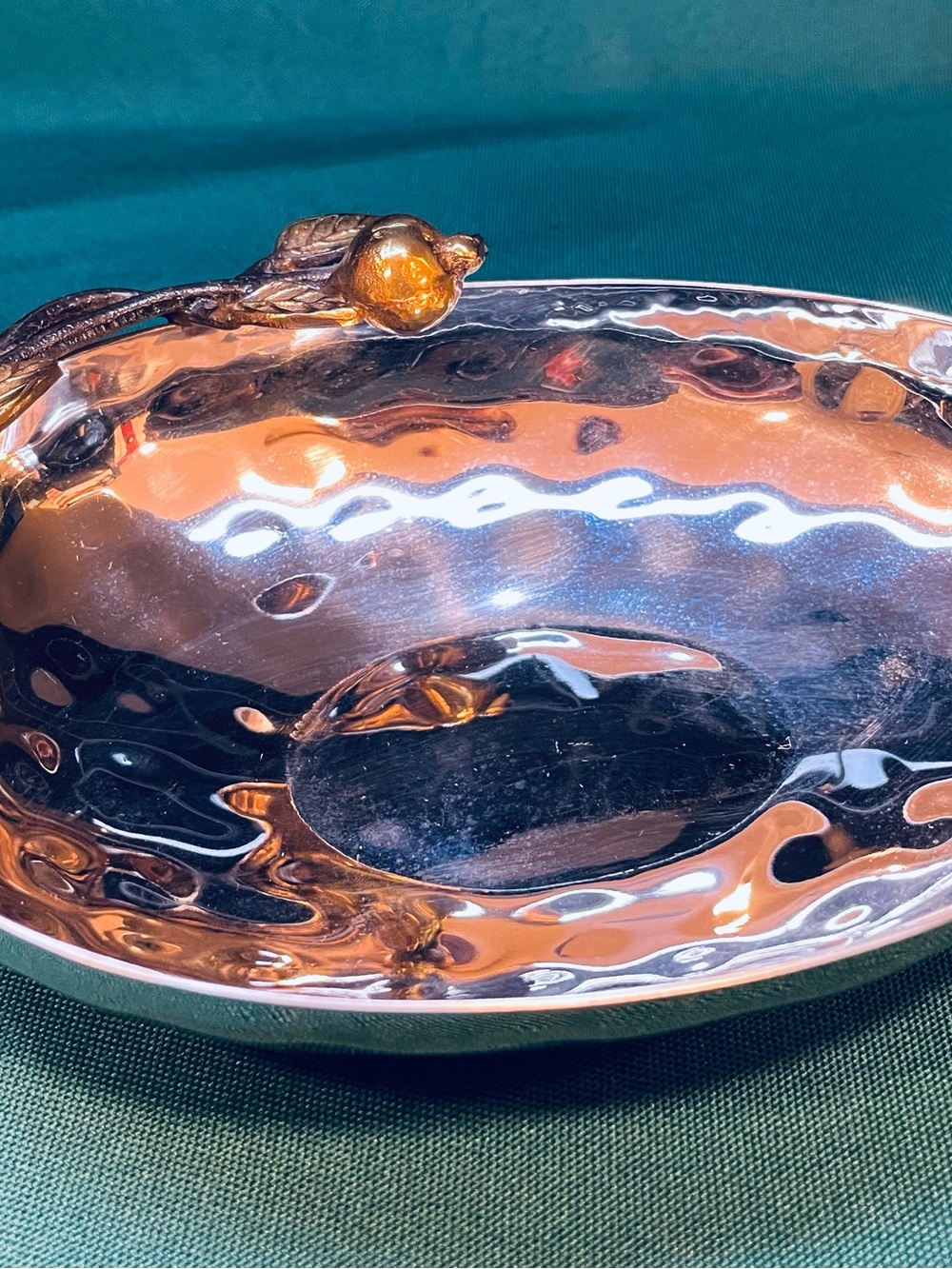 Beautiful stainless steel hammered finish bowl w/ branch of golden pomegranates